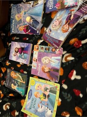 New and Like New Disney Frozen and Frozen 2 Bundle  8 items total as pictured